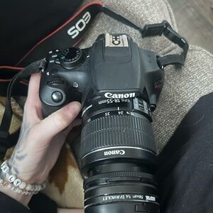 Canon Black DSLR Camera with Zoom Lens